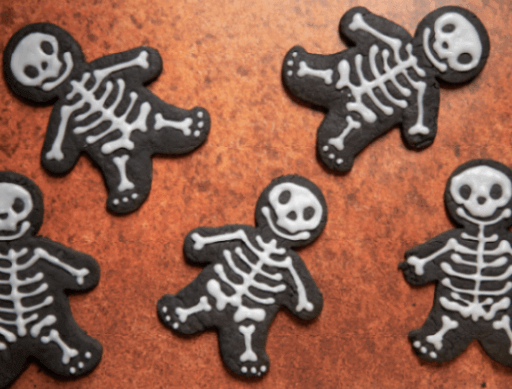 gingerbread men decorated with skeleton icing